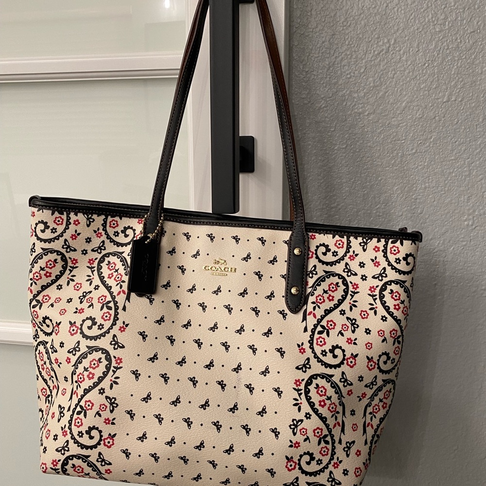 Used Coach purse with two shoulder straps and matching Coach wallet.